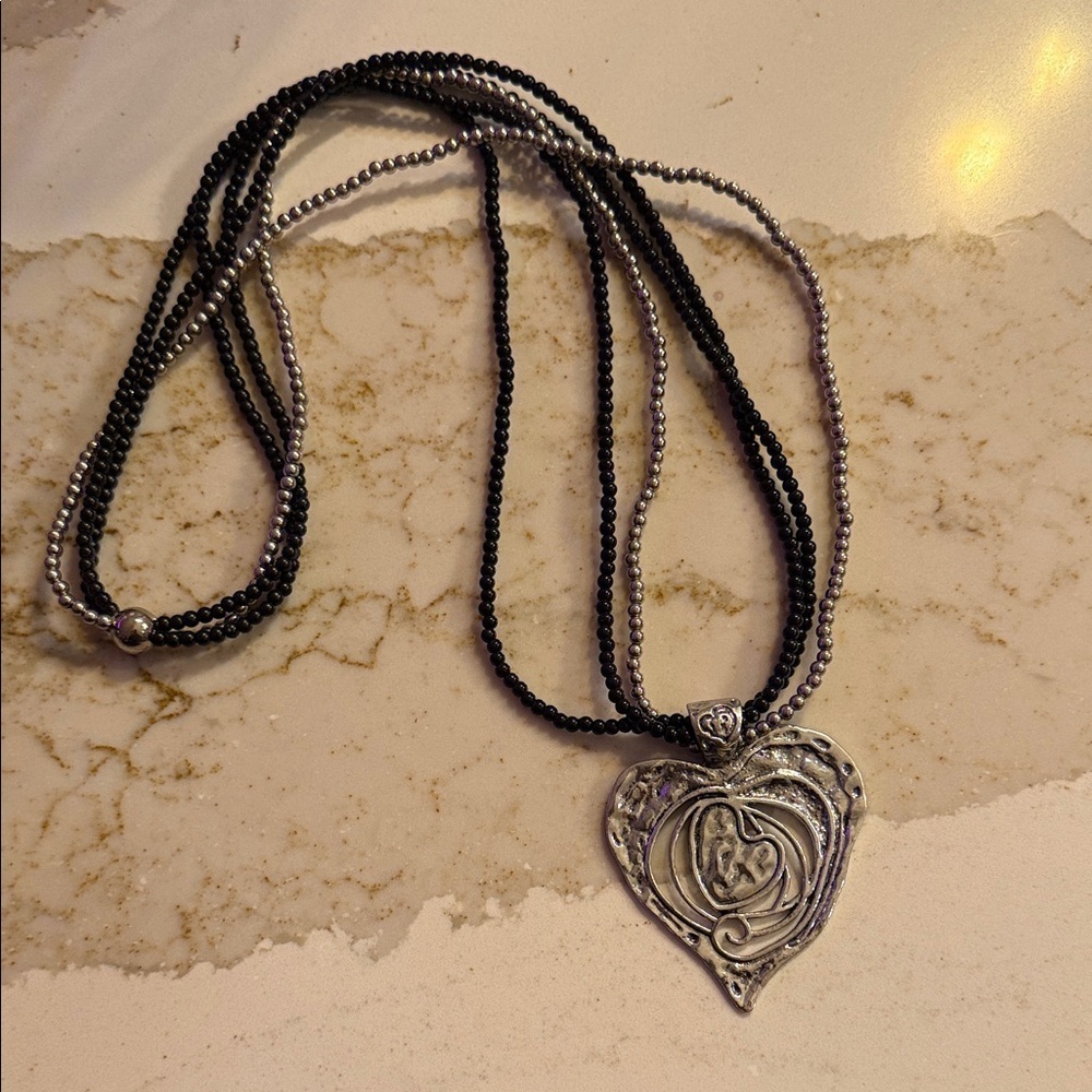 Elegant Silver and Black Heart Pendant Necklace